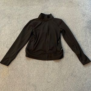 Size medium Champion workout zip up jacket in black.